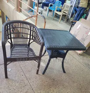 Home Coffe Table and Strong Plastic Chair.