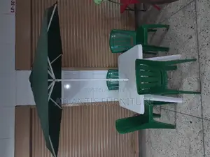 Umbrella With Table and Chairs