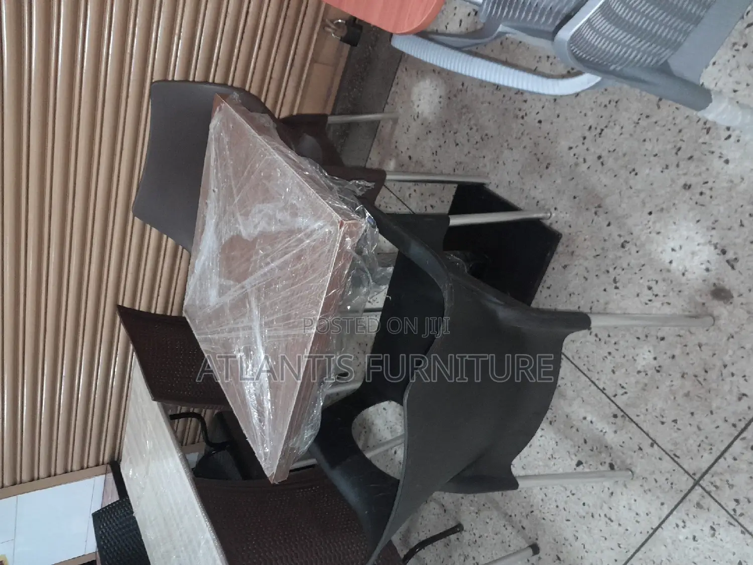 Black Chairs With One Stand Brawn Table