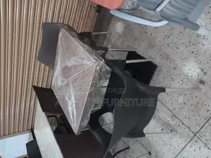 Black Chairs With One Stand Brawn Table