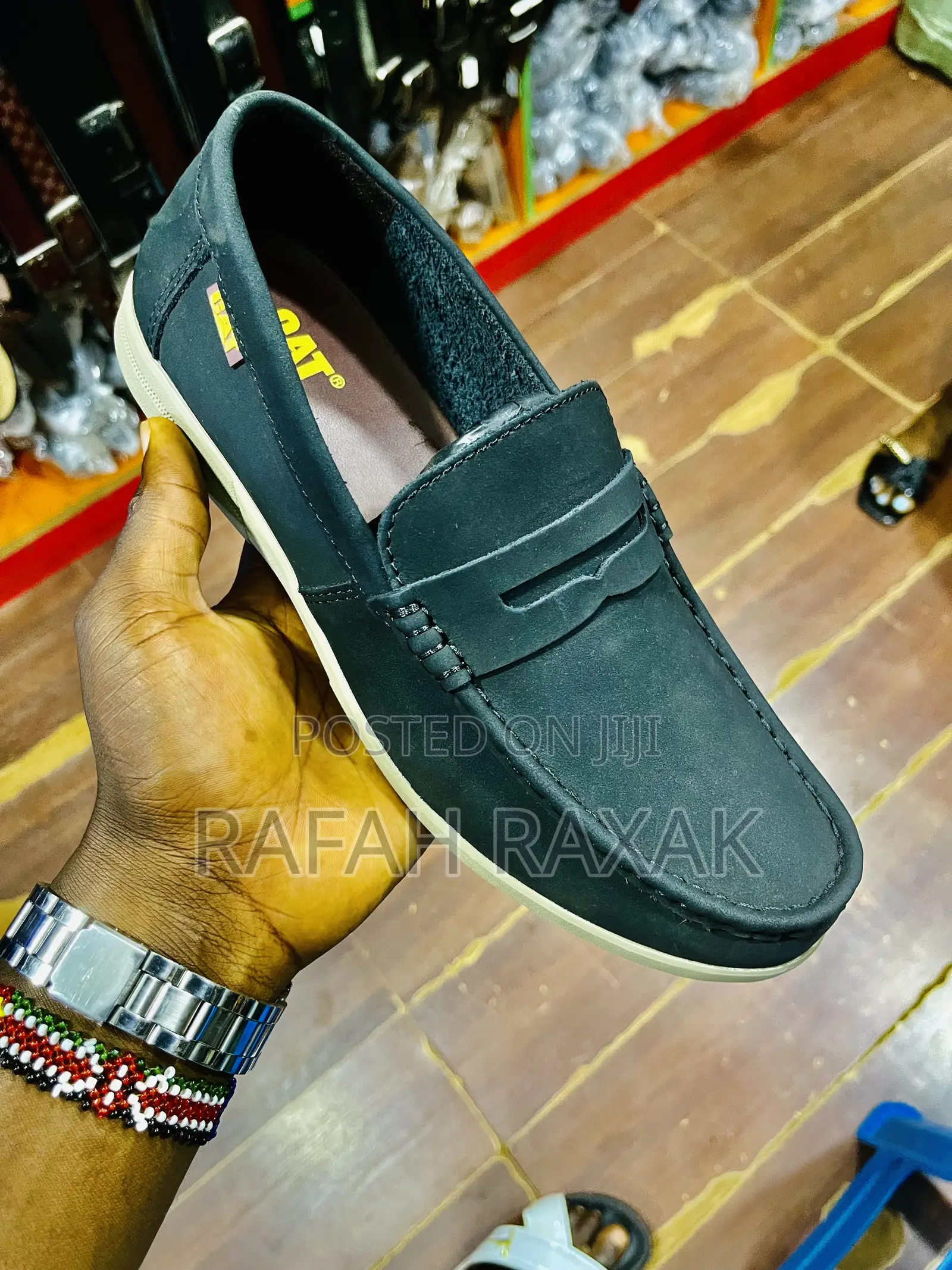 Original Black CAT Light Leather Moccasins