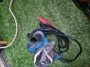 An Electric Polisher Has Soft Pad to Clean $ Smooth Surface