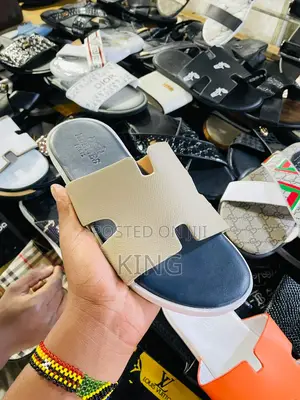 Hermes Sandals. White Slide Leather