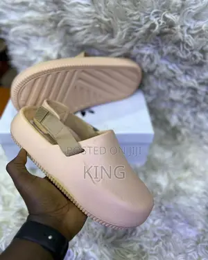 Nike Calm Crocs Mule. Pink