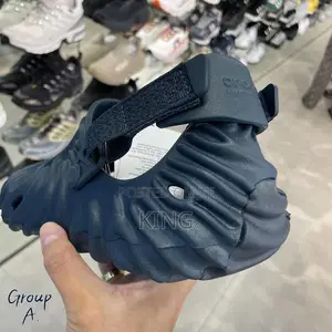 Black Crocs.