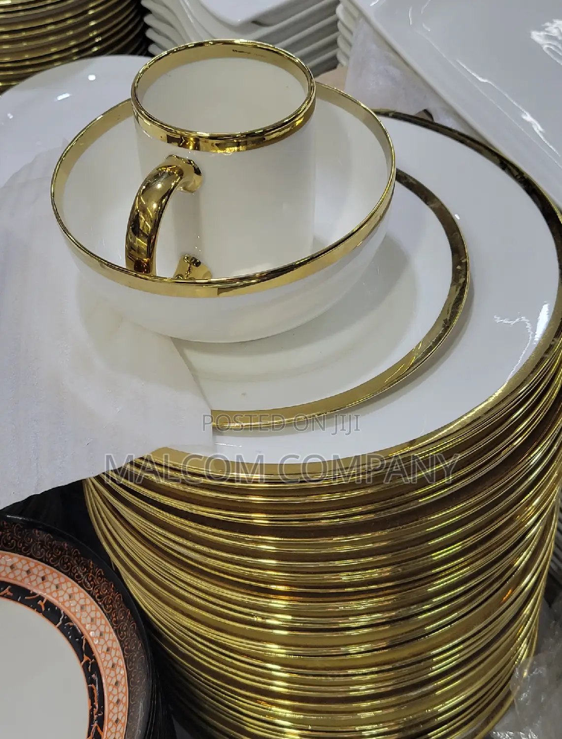 A Dozen of Dinner Golden Plates