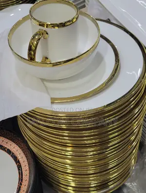 A Dozen of Dinner Golden Plates