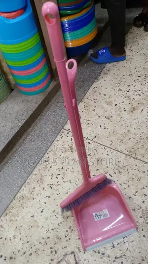 Dust Pan With a Broom