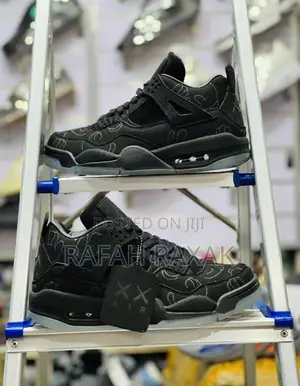 Original Black Air Jordan 4 X KAWS Sneakers