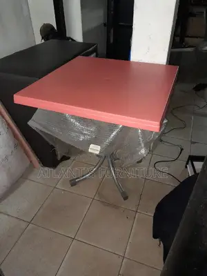 Orange Steel Legs Restaurant Table