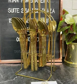Set of Gold Cutlery With Stand