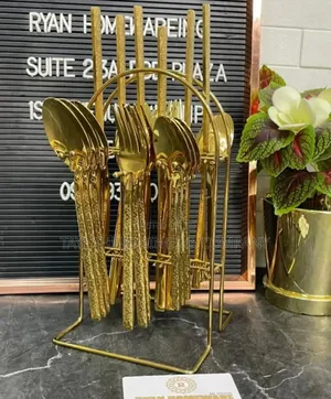 Set of Gold Cutlery With Stand