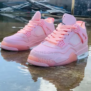Nike Air Jordan 4 Pink Authentic Sneakers.