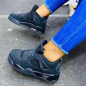 Nike Air Jordan 4 Black. Authentic Sneakers