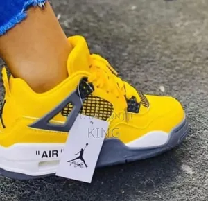Yellowy Air Jordan 4 Retro Sneakers