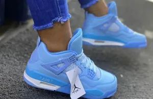 Blue Air Jordan 4 Sneakers.