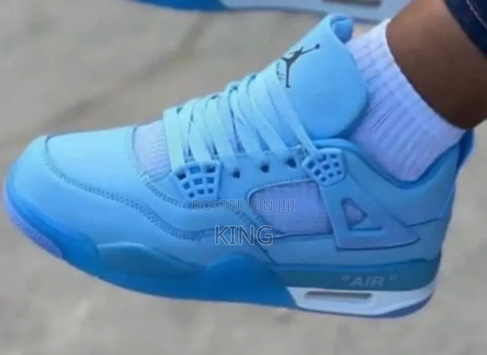 Air Jordan 4 Retro Sneakers. Sky-Blue