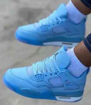 Air Jordan 4 Retro Sneakers. Sky-Blue