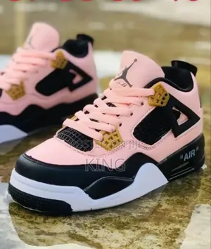 Pink Nike Air Jordan 4 With Black and White Sneakers