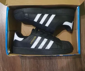 Adidas Superstar Trainers. Black and White