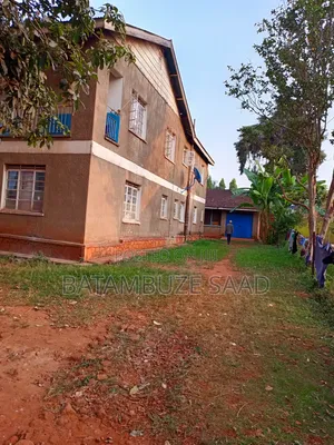 Plot and House for Urgent Sale