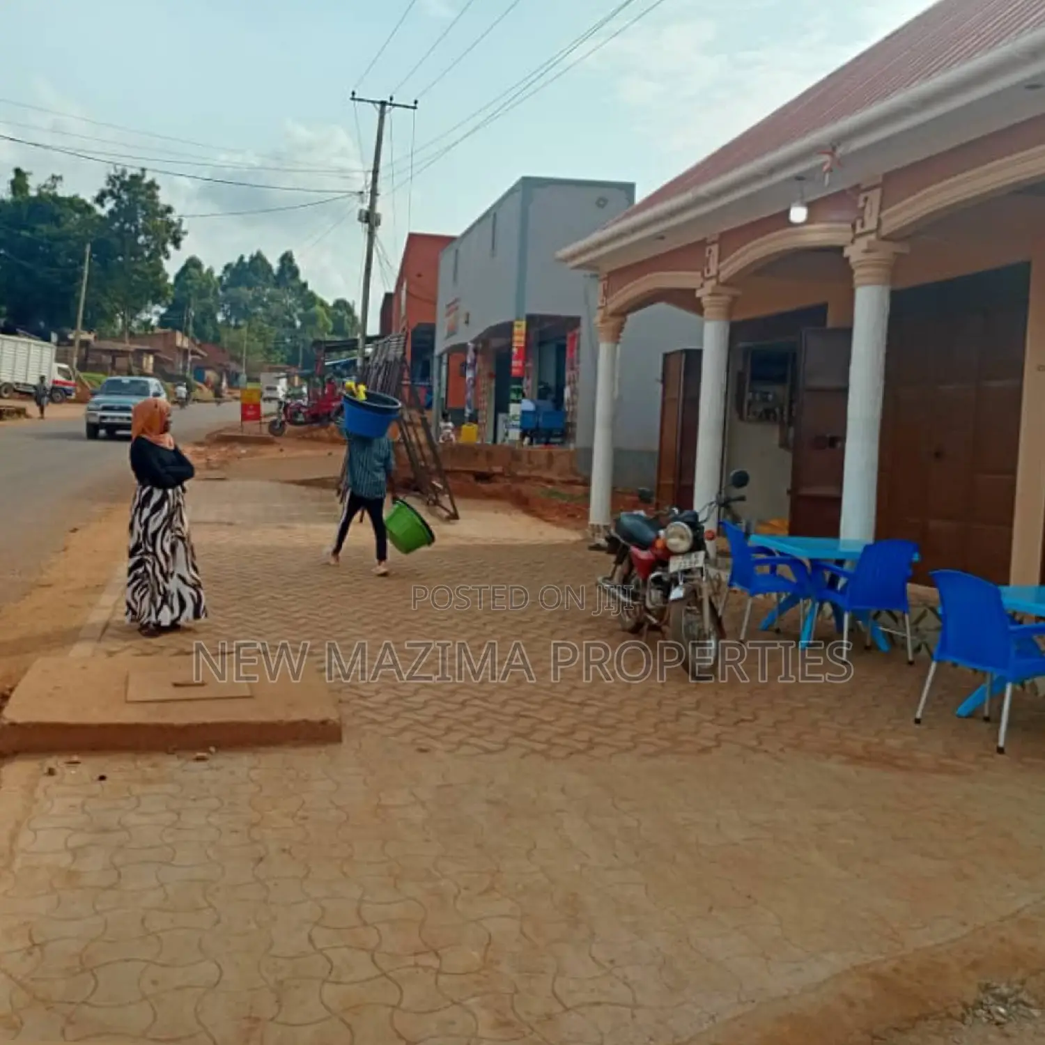 Three Commercial Double Shops With 8 Singles Onsale Nansana