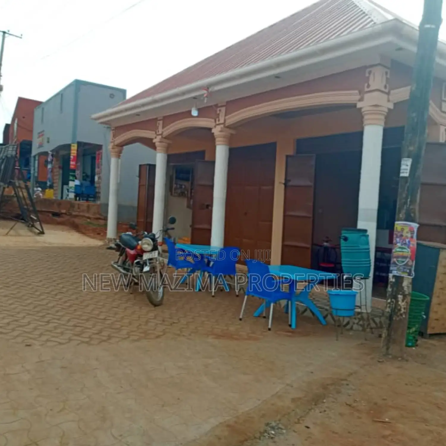 Three Commercial Double Shops With 8 Singles Onsale Nansana