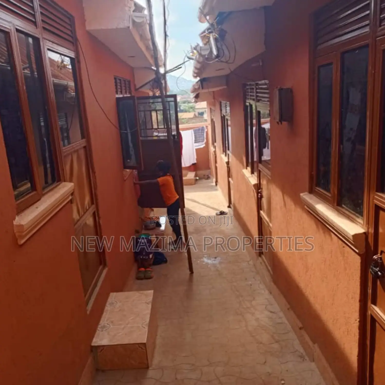 Three Commercial Double Shops With 8 Singles Onsale Nansana