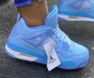 Womens Sneakers. Air Jordan 4