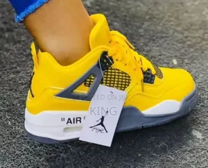Yellow Air Jordan 4 Sneakers