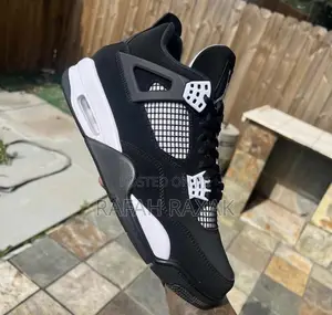 Original Thunder Black/White Air Jordan 4 Retro Sneaker