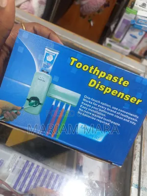 Toothpaste Dispenser With Toothbrush Holder