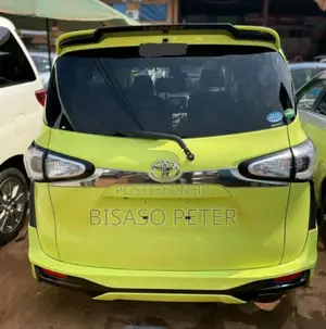 Toyota Sienta 1.5 AWD (6-seater) 2015 Yellow