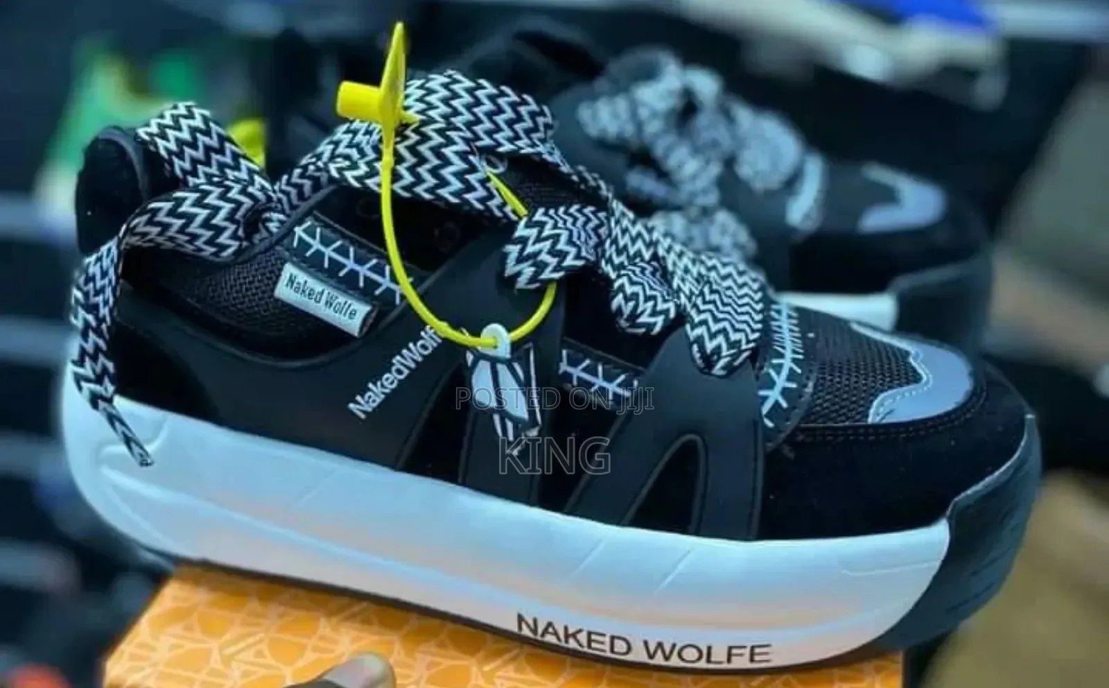 Naked Wolfe Slider Premium Sneakers. White Sole