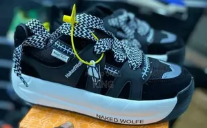 Naked Wolfe Slider Premium Sneakers. White Sole