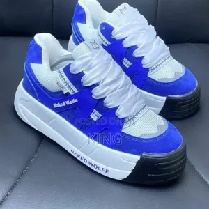 Naked Wolfe Sneakers. Blue White Loft