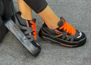 Naked Wolfe Sneakers. Black Mid Orange