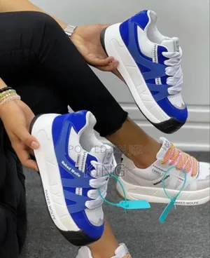 Naked Wolfe Sneakers. Hot Blue