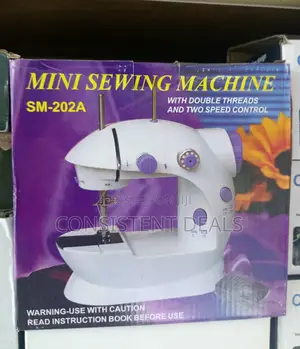 Portable Electric Mini Sewing Machine