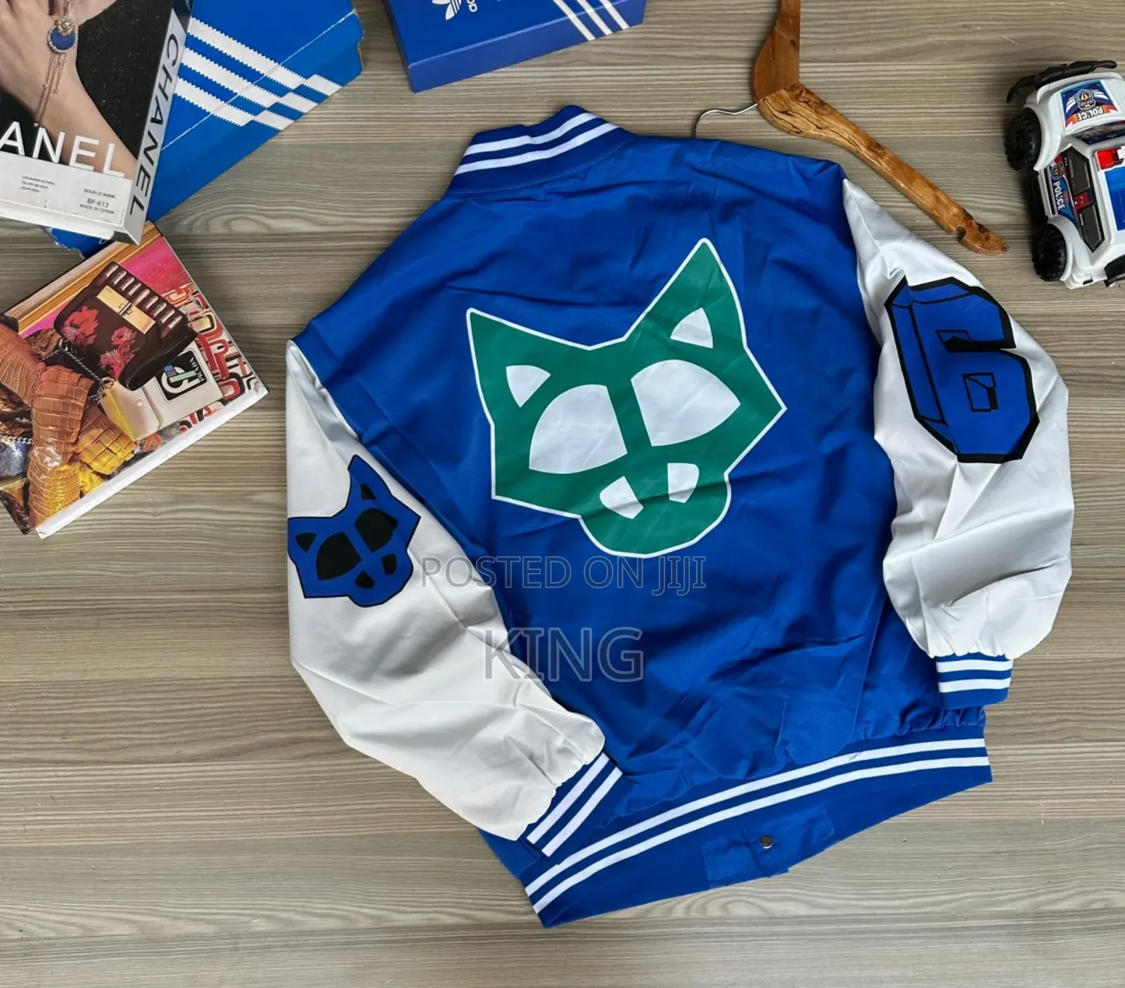 Playcard Baseball Jacket. Naked Wolfe