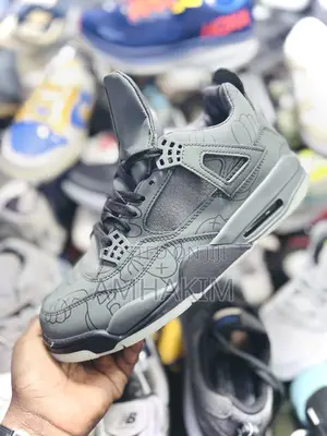 Jordan 4 X Kaws in Stock