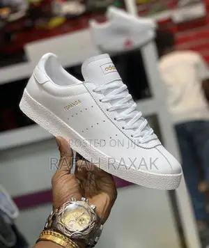 Original Triple White Adidas Topanga Sneakers