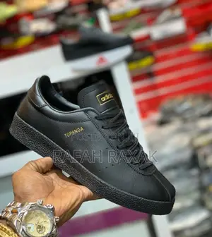 Original Triple Black Adidas Topanga Sneakers