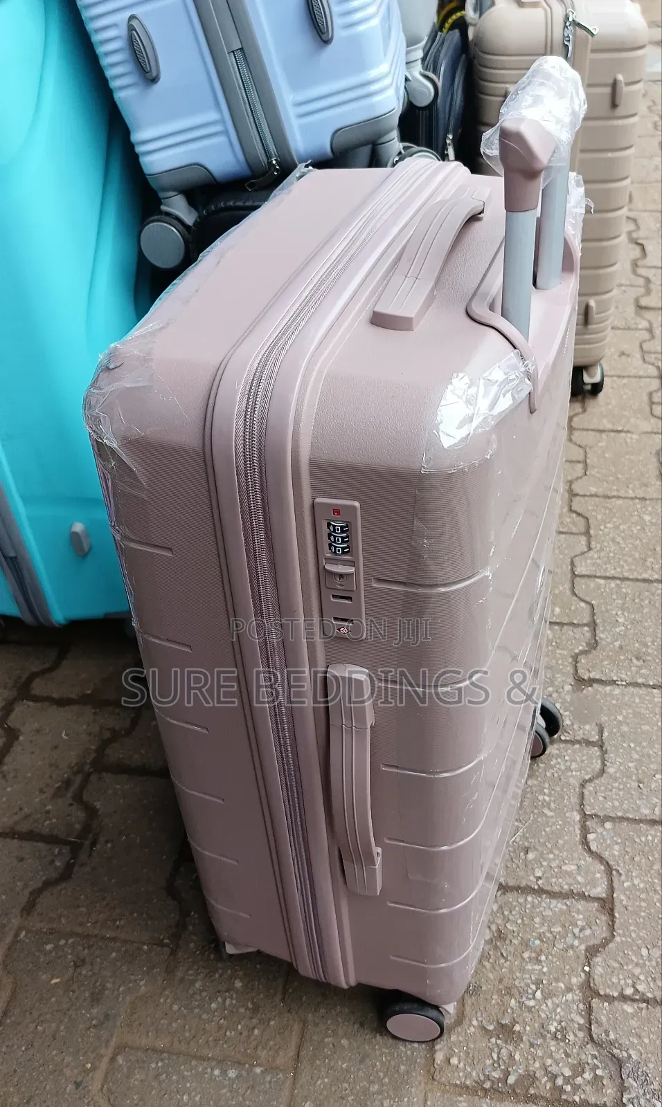 Coral Medium Rubber Suitcase