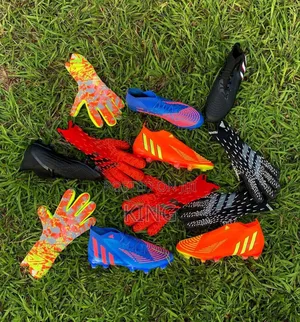 Football Goalkeeper Gloves and Soccer Boots. Pr