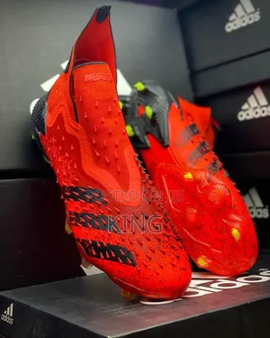 Adidas Predator Freak + FG Soccer Boots. Orange