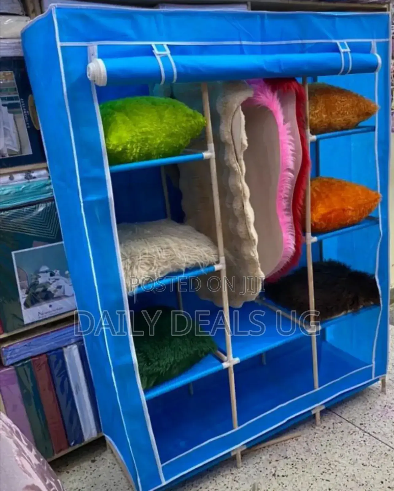 Wooden Poles Blue Clothes Wardrobe