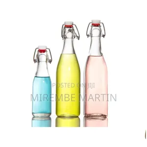 Homeprism Stylish Transparent Glass Bottle With Top Cap.