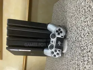 PS4 Slim Consoles Each With a Pad