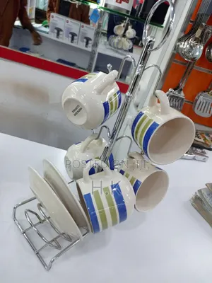 6 Cups and Saucer With a Stand